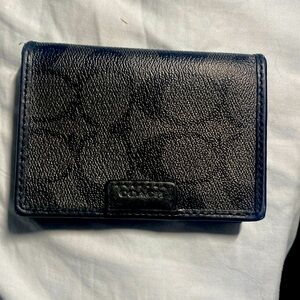 Coach wallet. Fits 4+ cards.